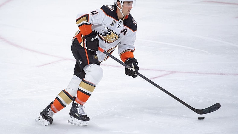 Feb 15, 2024; Ottawa, Ontario, CAN; Anaheim Ducks defenseman Cam Fowler (4) skates with the puck in the third period against the  Ottawa Senators at the Canadian Tire Centre. Mandatory Credit: Marc DesRosiers-USA TODAY Sports