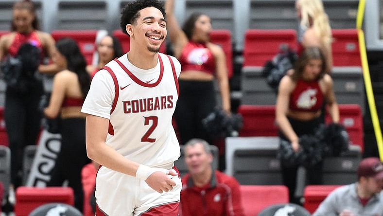 Feb 15, 2024; Pullman, Washington, USA; Washington State Cougars guard Myles Rice (2) cracks a smile after a score against the California Golden Bears in the second half at Friel Court at Beasley Coliseum. Washington State Cougars won 84-65. Mandatory Credit: James Snook-USA TODAY Sports