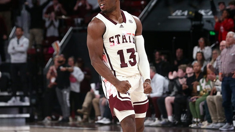 Feb 17, 2024; Starkville, Mississippi, USA; Mississippi State Bulldogs guard Josh Hubbard (13) reacts after a three point basket against the Arkansas Razorbacks during the second half at Humphrey Coliseum. Mandatory Credit: Petre Thomas-USA TODAY Sports