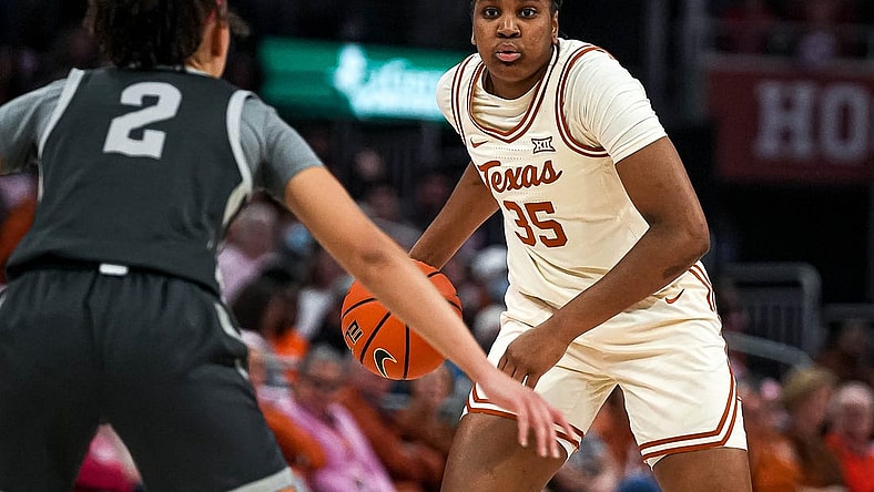 Texas Longhorns guard Madison Booker (35) looks for an open team mate for a pass during the basketball game against Iowa State at the Moody Center on Saturday, Feb. 17, 2024 in Austin.