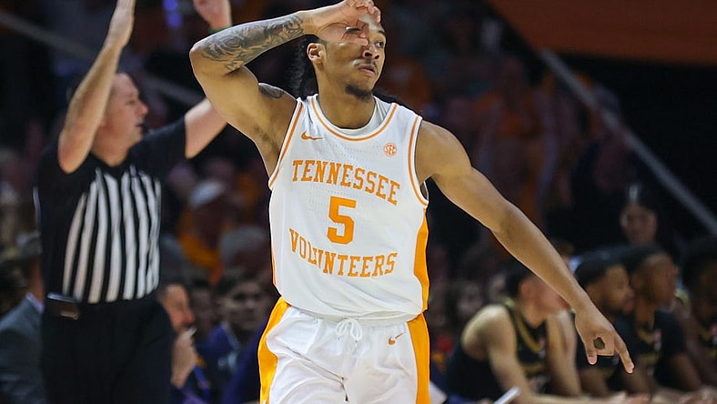 Feb 17, 2024; Knoxville, Tennessee, USA; Tennessee Volunteers guard Zakai Zeigler (5) reacts after shooting for three points against the Vanderbilt Commodores during the first half at Thompson-Boling Arena at Food City Center. Mandatory Credit: Randy Sartin-USA TODAY Sports