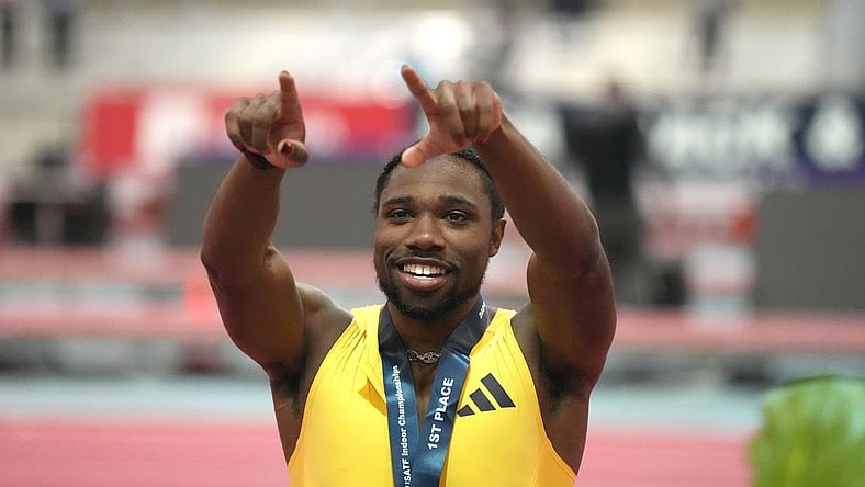Feb 17, 2024; Albuquerque, NM, USA; Noah Lyles gestures after winning the 60m in 6.43 during the USATF Indoor Championships at Albuquerque Convention Center. Mandatory Credit: Kirby Lee-USA TODAY Sports