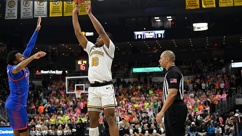 Feb 17, 2024; Providence, Rhode Island, USA; Providence Friars forward Rich Barron (10)  shoots against the DePaul Blue Demons during the first half at Amica Mutual Pavilion. Mandatory Credit: Eric Canha-USA TODAY Sports