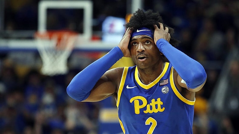 Feb 17, 2024; Pittsburgh, Pennsylvania, USA;  Pittsburgh Panthers forward Blake Hinson (2) reacts after making a three point basket against the Louisville Cardinals during the first half at the Petersen Events Center. Pittsburgh won 86-59. Mandatory Credit: Charles LeClaire-USA TODAY Sports