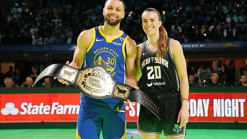 Feb 17, 2024; Indianapolis, IN, USA; Golden State Warriors guard Stephen Curry (30) and New York Liberty guard Sabrina Ionescu (20) after the Stephen vs Sebrina three-point challenge during NBA All Star Saturday Night at Lucas Oil Stadium. Mandatory Credit: Kyle Terada-USA TODAY Sports