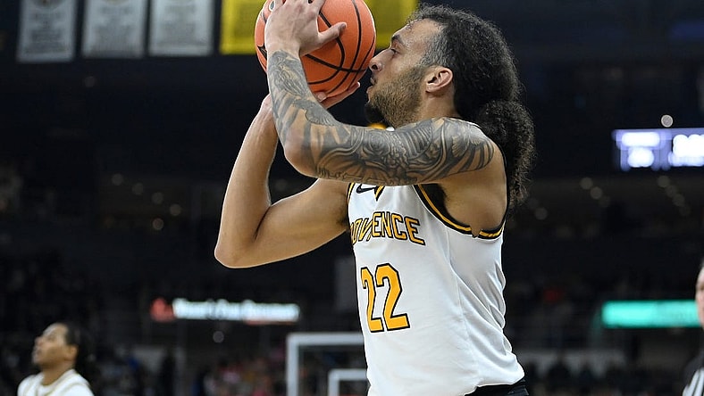 Feb 17, 2024; Providence, Rhode Island, USA; Providence Friars guard Devin Carter (22) shoots the ball against the DePaul Blue Demons during the first half at Amica Mutual Pavilion. Mandatory Credit: Eric Canha-USA TODAY Sports