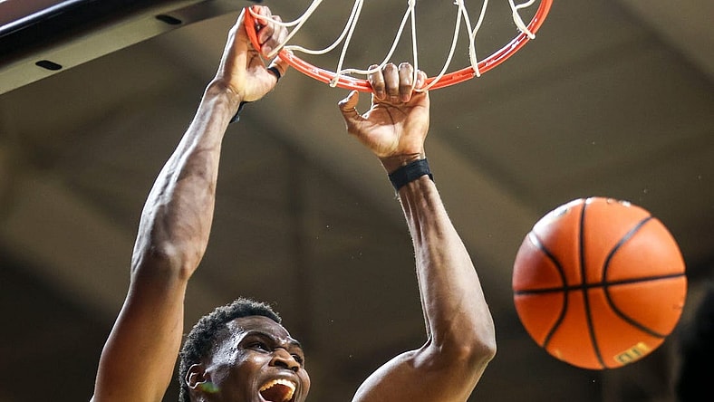 Oregon Ducks center N'Faly Dante (1) dunks the ball to give the Ducks a win against the Oregon State Beavers on Saturday, Feb. 17, 2024 at Gill Coliseum in Corvallis, Ore. The final score of the game was 60-58.