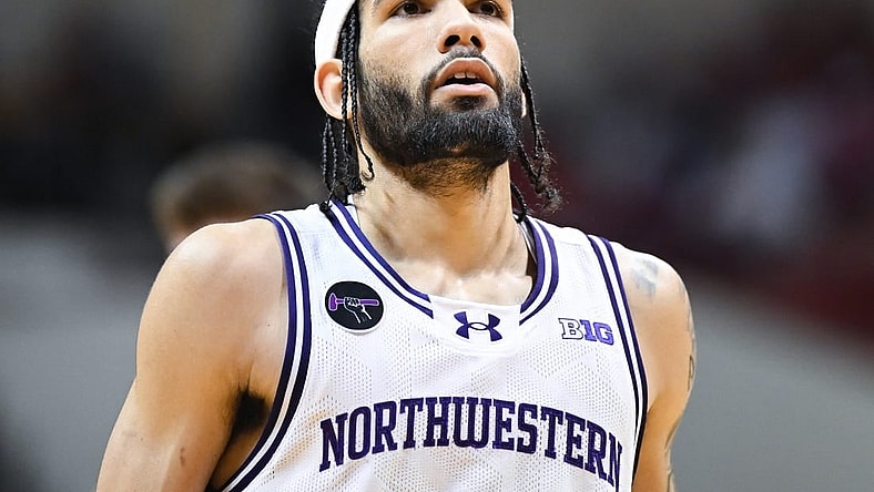 Feb 18, 2024; Bloomington, Indiana, USA;  Northwestern Wildcats guard Boo Buie (0) waits to attempt a free throw against the Indiana Hoosiers during the second half at Simon Skjodt Assembly Hall. Mandatory Credit: Robert Goddin-USA TODAY Sports