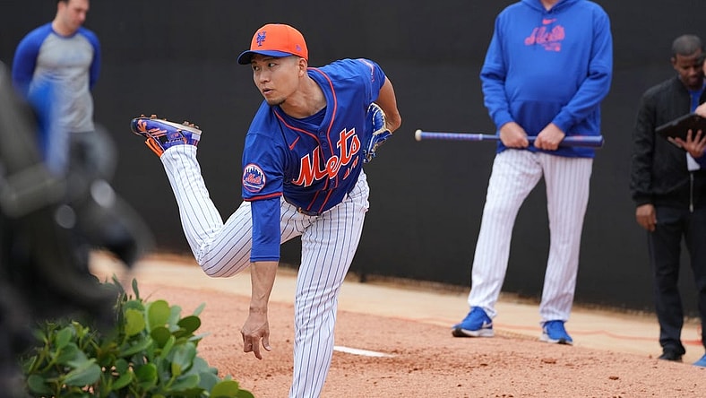 Feb 19, 2024; Port St. Lucie, FL, USA; New York Mets starting pitcher Kodai Senga (34) warms-up during workouts at spring training. Mandatory Credit: Jim Rassol-USA TODAY Sports