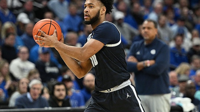 Feb 13, 2024; Omaha, Nebraska, USA;  Georgetown Hoyas guard Jayden Epps (10) passes against the Creighton Bluejays in the first half at CHI Health Center Omaha. Mandatory Credit: Steven Branscombe-USA TODAY Sports