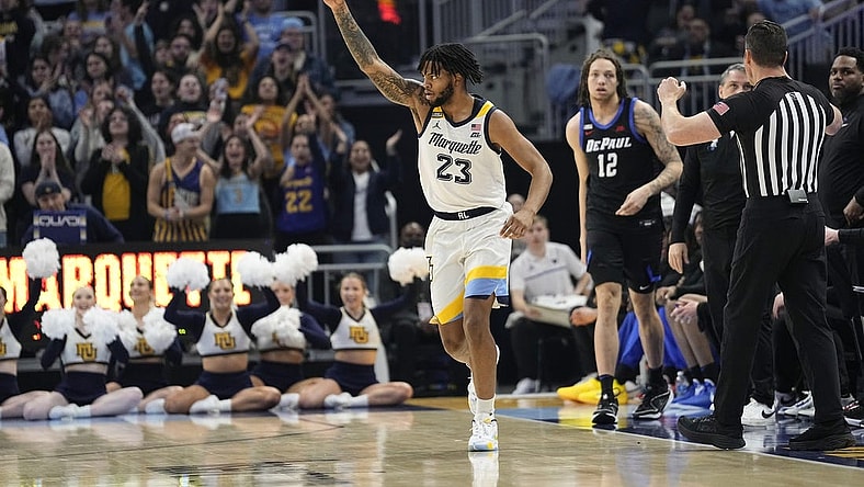 Feb 21, 2024; Milwaukee, Wisconsin, USA;  Marquette Golden Eagles forward David Joplin (23) celebrates after scoring a basket during the first half against the DePaul Blue Demons at Fiserv Forum. Mandatory Credit: Jeff Hanisch-USA TODAY Sports