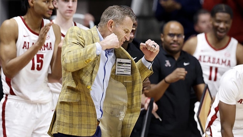 Feb 21, 2024; Tuscaloosa, Alabama, USA; Alabama Crimson Tide head coach Nate Oats reacts after a three pointer during overtime against the Florida Gators at Coleman Coliseum. Mandatory Credit: Butch Dill-USA TODAY Sports