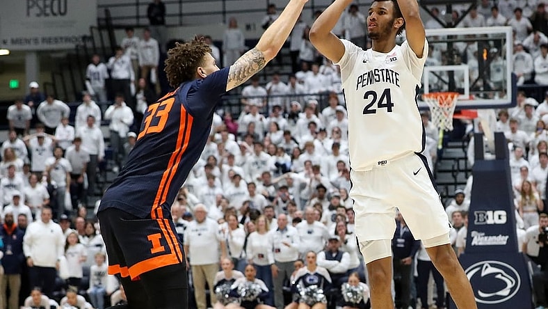 Feb 21, 2024; University Park, Pennsylvania, USA; Penn State Nittany Lions forward Zach Hicks (24) shoots before being fouled by Illinois Fighting Illini forward Coleman Hawkins (33) during the second half at Rec Hall. Penn State defeated Illinois 90-89. Mandatory Credit: Matthew O'Haren-USA TODAY Sports