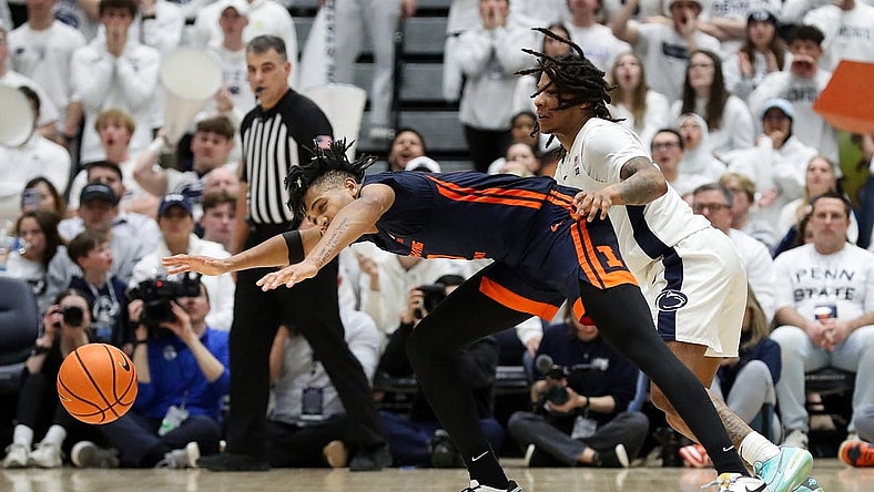 Feb 21, 2024; University Park, Pennsylvania, USA; Illinois Fighting Illini guard Terrence Shannon Jr (0) loses control of the ball during the second half against the Penn State Nittany Lions at Rec Hall. Penn State defeated Illinois 90-89. Mandatory Credit: Matthew O'Haren-USA TODAY Sports