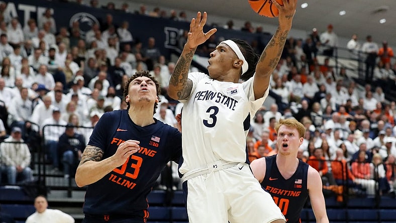 Feb 21, 2024; University Park, Pennsylvania, USA; Penn State Nittany Lions guard Nick Kern Jr (3) drives as Illinois Fighting Illini forward Coleman Hawkins (33) defends during the second half at Rec Hall. Penn State defeated Illinois 90-89. Mandatory Credit: Matthew O'Haren-USA TODAY Sports