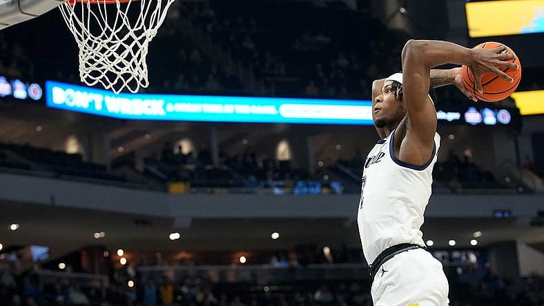 Marquette guard Chase Ross (2) dunks the ball after a steal during the first half of their game against DePaul Wednesday, February 21, 2024 at Fiserv Forum in Milwaukee, Wisconsin.