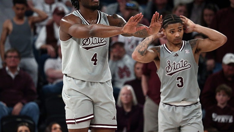 Feb 21, 2024; Starkville, Mississippi, USA; Mississippi State Bulldogs forward Cameron Matthews (4) and guard Shakeel Moore (3) react during the second half against the Mississippi Rebels at Humphrey Coliseum. Mandatory Credit: Petre Thomas-USA TODAY Sports