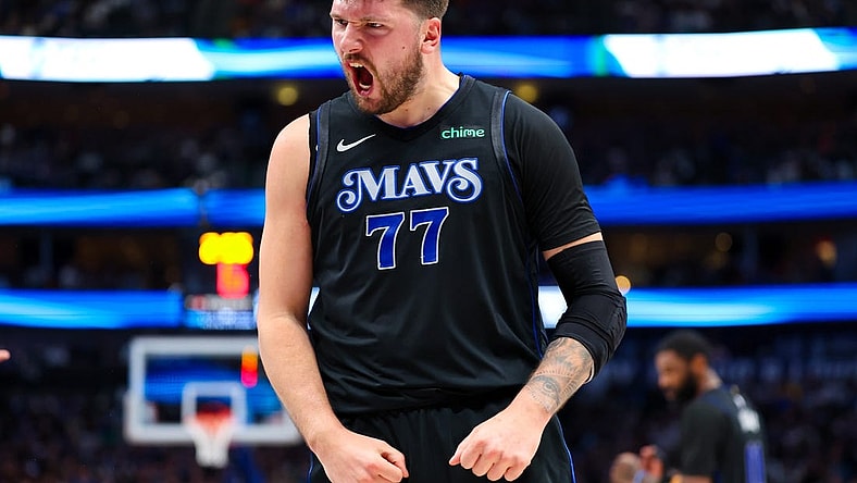 Feb 22, 2024; Dallas, Texas, USA;  Dallas Mavericks guard Luka Doncic (77) reacts during the first half against the Phoenix Suns at American Airlines Center. Mandatory Credit: Kevin Jairaj-USA TODAY Sports