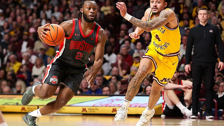 Feb 22, 2024; Minneapolis, Minnesota, USA; Ohio State Buckeyes guard Bruce Thornton (2) works toward the basket as Minnesota Golden Gophers guard Braeden Carrington (4) defends during the second half at Williams Arena. Mandatory Credit: Matt Krohn-USA TODAY Sports