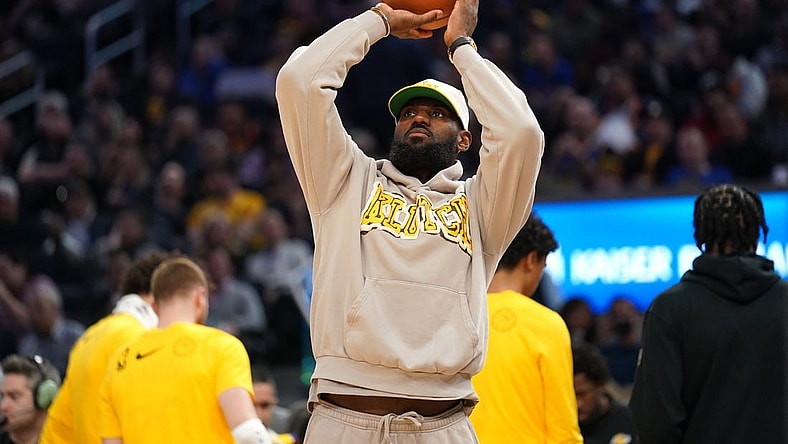 Feb 22, 2024; San Francisco, California, USA; Los Angeles Lakers forward Lebron James (23) shoots the ball during a timeout against the Golden State Warriors in the third quarter at the Chase Center. Mandatory Credit: Cary Edmondson-USA TODAY Sports