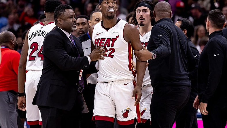 Feb 23, 2024; New Orleans, Louisiana, USA;  Miami Heat forward Jimmy Butler (22) and New Orleans Pelicans forward Naji Marshall (8) and guard Jose Alvarado (15) are ejected after a melee due to a play during the second half at Smoothie King Center. Mandatory Credit: Stephen Lew-USA TODAY Sports