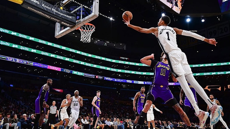 Feb 23, 2024; Los Angeles, California, USA; San Antonio Spurs center Victor Wembanyama (1) shoots against Los Angeles Lakers center Jaxson Hayes (11) during the second half at Crypto.com Arena. Mandatory Credit: Gary A. Vasquez-USA TODAY Sports