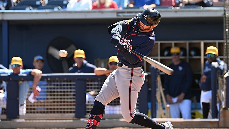 Feb 24, 2024; Port Charlotte, Florida, USA; Atlanta Braves right fielder Forrest Wall (73) hits a RBI single in the second inning of a spring training game against theTampa Bay Rays at Charlotte Sports Park. Mandatory Credit: Jonathan Dyer-USA TODAY Sports