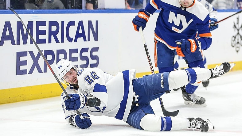 Feb 24, 2024; Elmont, New York, USA;  Tampa Bay Lightning right wing Nikita Kucherov (86) falls on the ice after a collision in the first period against the New York Islanders at UBS Arena. Mandatory Credit: Wendell Cruz-USA TODAY Sports