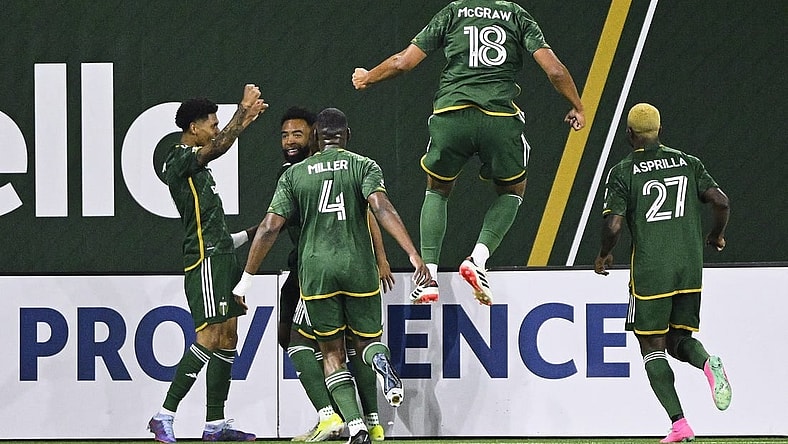 Feb 24, 2024; Portland, Oregon, USA; Portland Timbers forward Antony (11) celebrates with his teammates after scoring a goal against the Colorado Rapids at Providence Park. Mandatory Credit: Troy Wayrynen-USA TODAY Sports