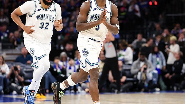 Feb 24, 2024; Minneapolis, Minnesota, USA; Minnesota Timberwolves guard Anthony Edwards (5) celebrates his three-point basket against the Brooklyn Nets during the second half at Target Center. Mandatory Credit: Matt Krohn-USA TODAY Sports