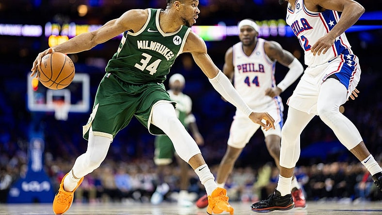 Feb 25, 2024; Philadelphia, Pennsylvania, USA; Milwaukee Bucks forward Giannis Antetokounmpo (34) controls the ball against Philadelphia 76ers forward Tobias Harris (12) during the second quarter at Wells Fargo Center. Mandatory Credit: Bill Streicher-USA TODAY Sports