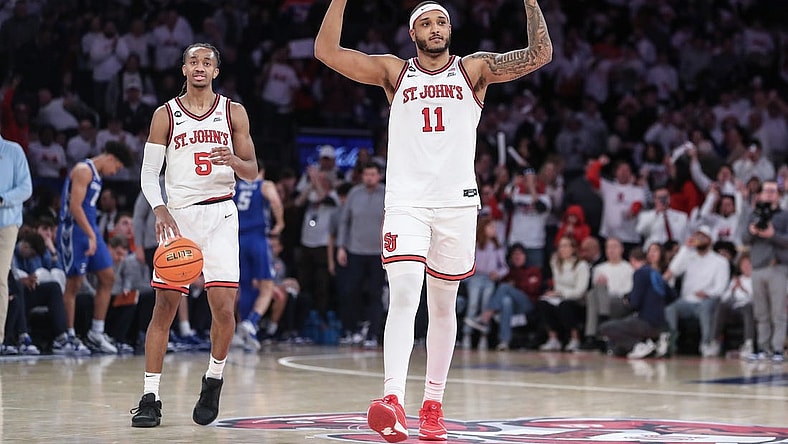 Feb 25, 2024; New York, New York, USA;  St. John's Red Storm center Joel Soriano (11) celebrates in the second half as guard Daniss Jenkins (5) runs out the clock against the Creighton Bluejays at Madison Square Garden. Mandatory Credit: Wendell Cruz-USA TODAY Sports