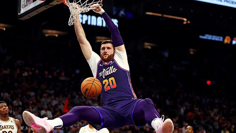Feb 25, 2024; Phoenix, Arizona, USA; Phoenix Suns center Jusuf Nurkic (20) dunks the ball during the second quarter of the game against the Los Angeles Lakers at Footprint Center. Mandatory Credit: Mark J. Rebilas-USA TODAY Sports