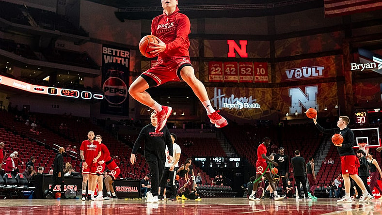 Feb 25, 2024; Lincoln, Nebraska, USA; Nebraska Cornhuskers guard Keisei Tominaga (30) jumps during warmups before the game against the Minnesota Golden Gophers at Pinnacle Bank Arena. Mandatory Credit: Dylan Widger-USA TODAY Sports