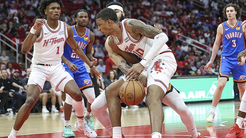 Feb 25, 2024; Houston, Texas, USA; Houston Rockets forward Jabari Smith Jr. (10) loses control of the ball during the second quarter against the Oklahoma City Thunder at Toyota Center. Mandatory Credit: Troy Taormina-USA TODAY Sports