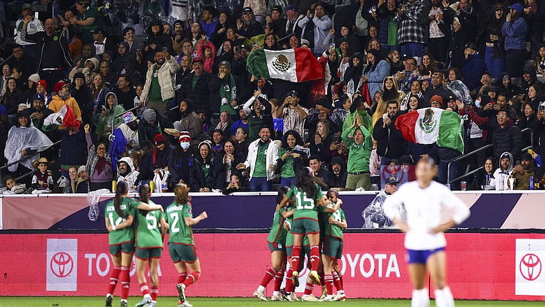 Feb 26, 2024; Carson, California, USA; Mexico midfielder Jacqueline Ovalle (11) celebrates with her teammates and fans cheer after Ovalle scores a goal during the first half of a game against the United States at Dignity Health Sports Park. Mandatory Credit: Jessica Alcheh-USA TODAY Sports