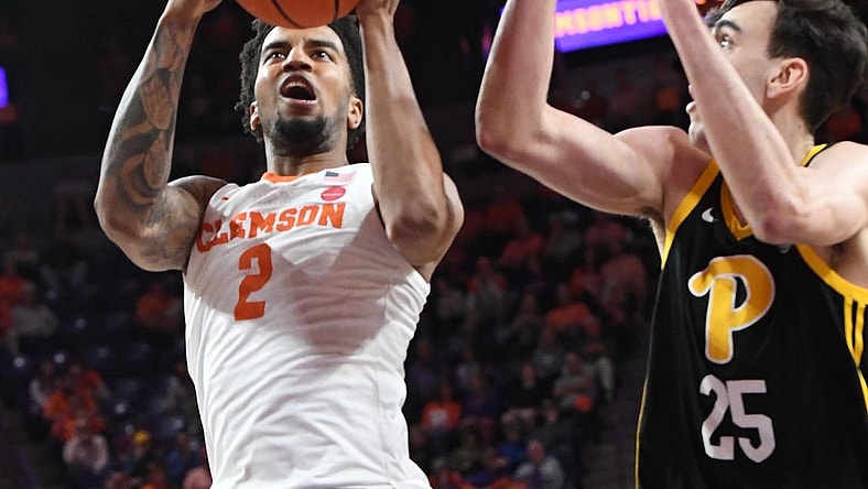 Feb 27, 2024; Clemson, South Carolina, USA;  Clemson sophomore guard Dillon Hunter (2) takes a shot near Pitt forward Guillermo Diaz Graham (25) during the first half at Littlejohn Coliseum. Mandatory Credit: Ken Ruinard-USA TODAY Sports