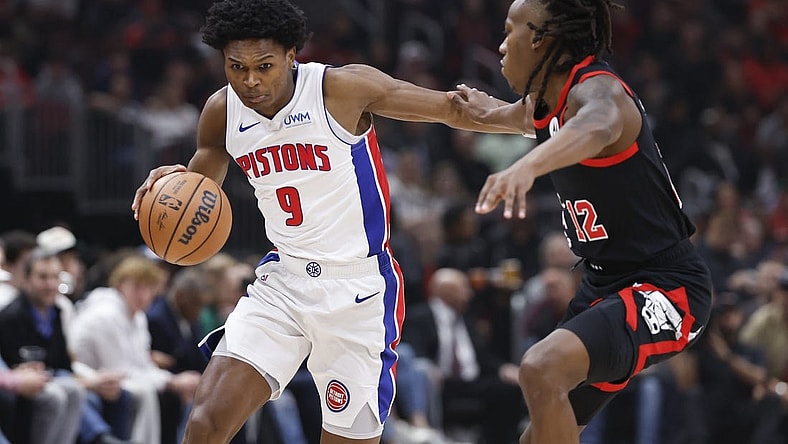 Feb 27, 2024; Chicago, Illinois, USA; Detroit Pistons forward Ausar Thompson (9) drives to the basket against Chicago Bulls guard Ayo Dosunmu (12) during the first half at United Center. Mandatory Credit: Kamil Krzaczynski-USA TODAY Sports