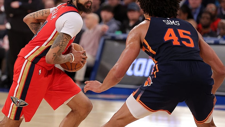 Feb 27, 2024; New York, New York, USA; New Orleans Pelicans forward Brandon Ingram (14) controls the ball against New York Knicks center Jericho Sims (45) during the third quarter at Madison Square Garden. Mandatory Credit: Brad Penner-USA TODAY Sports