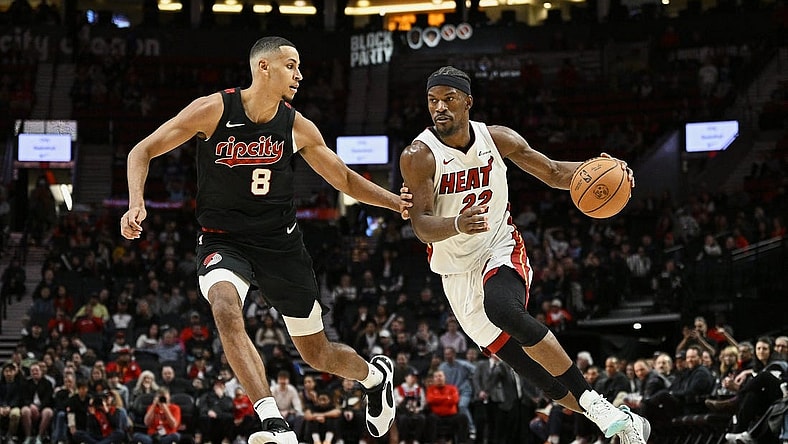 Feb 27, 2024; Portland, Oregon, USA; Miami Heat forward Jimmy Butler (22) drives to the basket during the second half against Portland Trail Blazers forward Kris Murray (8) at Moda Center. Mandatory Credit: Troy Wayrynen-USA TODAY Sports