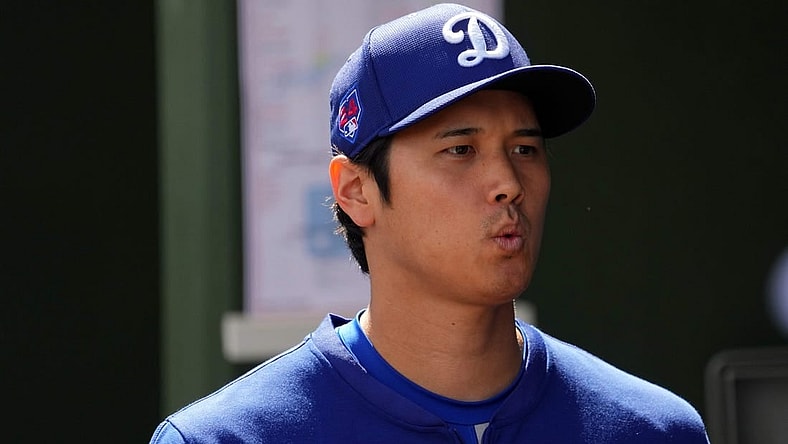Feb 28, 2024; Surprise, Arizona, USA; Los Angeles Dodgers designated hitter Shohei Ohtani (17) looks on prior to the game against the Texas Rangers at Surprise Stadium. Mandatory Credit: Joe Camporeale-USA TODAY Sports