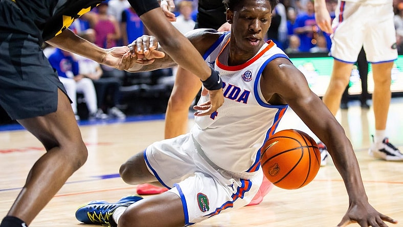 Florida Gators forward Tyrese Samuel (4) goes after a loose ball during the first half. The Florida men   s basketball team hosted the Missouri Tigers at Exactech Arena at the Stephen C. O   Connell Center in Gainesville, FL on Wednesday, February 28, 2024. [Doug Engle/Ocala Star Banner]