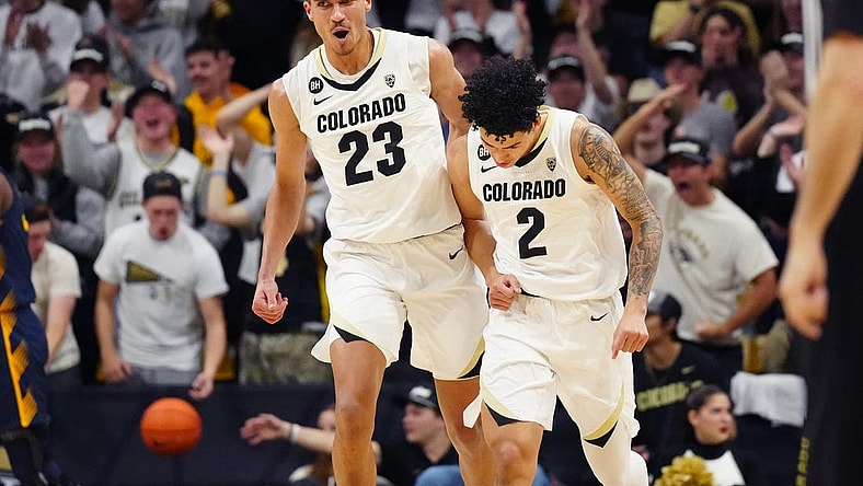 Feb 28, 2024; Boulder, Colorado, USA; Colorado Buffaloes forward Tristan da Silva (23) celebrates with guard KJ Simpson (2) in the first half against the California Golden Bears at the CU Events Center. Mandatory Credit: Ron Chenoy-USA TODAY Sports