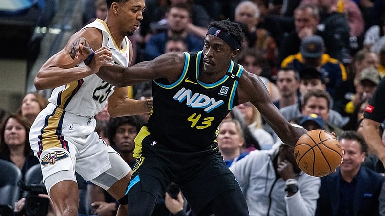 Feb 28, 2024; Indianapolis, Indiana, USA; Indiana Pacers forward Pascal Siakam (43) dribbles the ball while New Orleans Pelicans guard Trey Murphy III (25) defends in the first half at Gainbridge Fieldhouse. Mandatory Credit: Trevor Ruszkowski-USA TODAY Sports