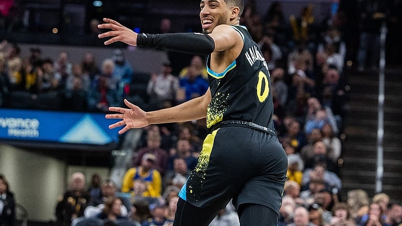 Feb 28, 2024; Indianapolis, Indiana, USA; Indiana Pacers guard Tyrese Haliburton (0) celebrates a basket in the second half against the New Orleans Pelicans at Gainbridge Fieldhouse. Mandatory Credit: Trevor Ruszkowski-USA TODAY Sports