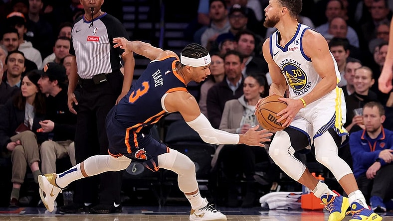 Feb 29, 2024; New York, New York, USA; Golden State Warriors guard Stephen Curry (30) looks to shoot a three point shot against New York Knicks guard Josh Hart (3) during the first quarter at Madison Square Garden. Mandatory Credit: Brad Penner-USA TODAY Sports
