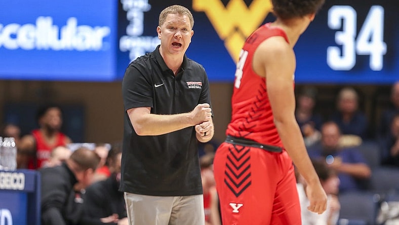 Dec 22, 2021; Morgantown, West Virginia, USA; Youngstown State Penguins head coach Jerrod Calhoun calls out a play during the second half against the West Virginia Mountaineers at WVU Coliseum. Mandatory Credit: Ben Queen-USA TODAY Sports