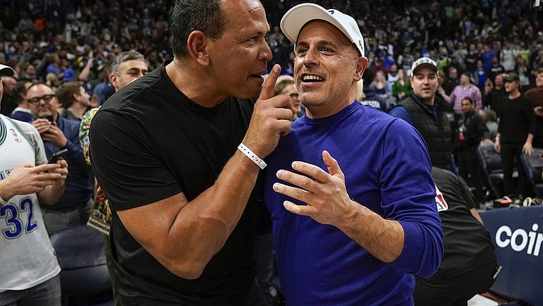 Apr 12, 2022; Minneapolis, Minnesota, USA;  Minnesota Timberwolves co-minority owners Alex Rodriguez and Marc Lore celebrate a victory over the Los Angeles Clippers after a play-in game at Target Center. Mandatory Credit: Nick Wosika-USA TODAY Sports
