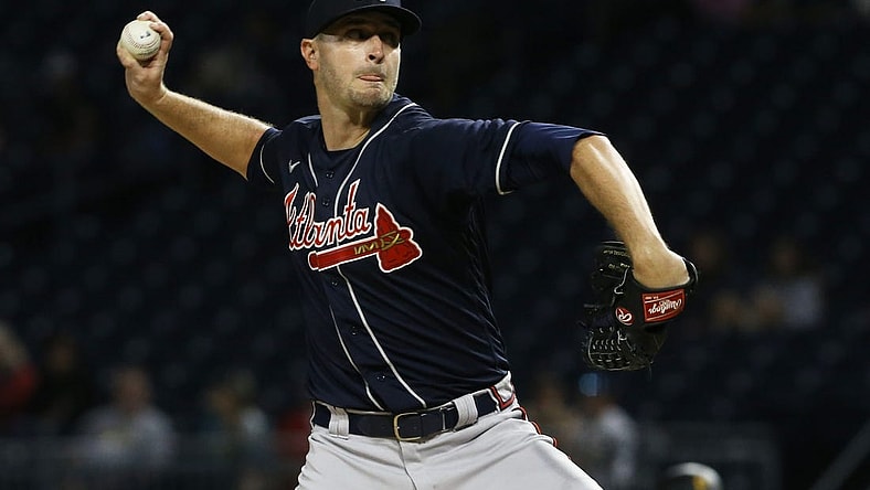 Aug 22, 2022; Pittsburgh, Pennsylvania, USA; Atlanta Braves starting pitcher Jake Odorizzi (12) delivers a pitch against the Pittsburgh Pirates during the first inning at PNC Park. Mandatory Credit: Charles LeClaire-USA TODAY Sports