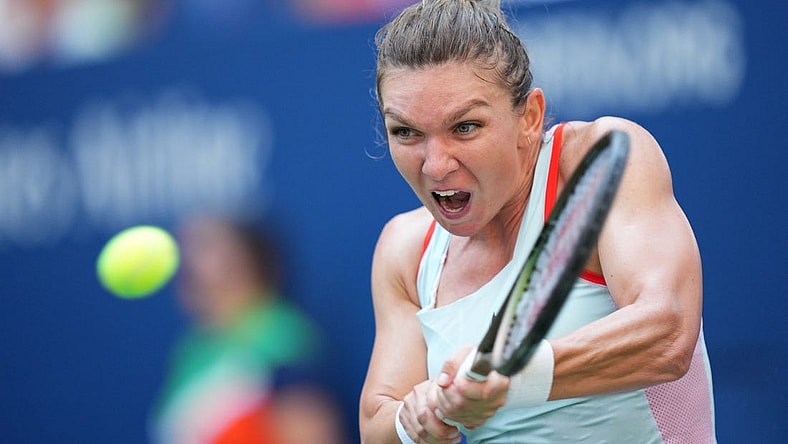 Aug 29, 2022; Flushing, NY, USA; Simona Halep of Romania hits to Daria Snigur of Ukraine on day one of the 2022 U.S. Open tennis tournament at USTA Billie Jean King National Tennis Center. Mandatory Credit: Danielle Parhizkaran-USA TODAY Sports
